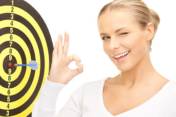 Image showing businesswoman with dart and target