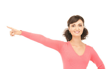 Image showing attractive businesswoman pointing her finger