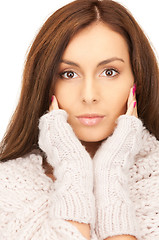 Image showing beautiful woman in mittens 