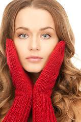 Image showing beautiful woman in red mittens 