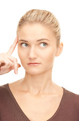 Image showing pensive businesswoman over white