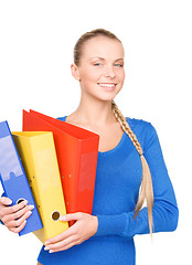 Image showing young attractive businesswoman with folders