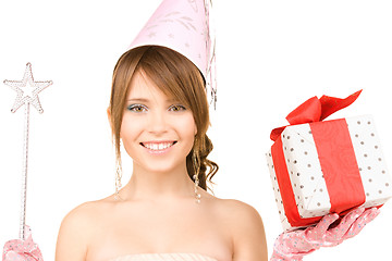 Image showing teenage party girl with magic wand and gift box