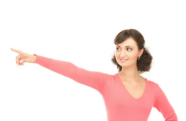 Image showing attractive businesswoman pointing her finger