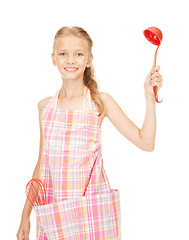 Image showing little housewife with red ladle