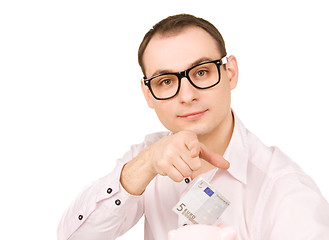 Image showing businessman with piggy bank and money