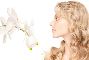 Image showing beautiful woman with white flower