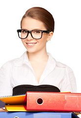 Image showing young attractive businesswoman with folders