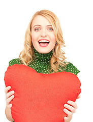 Image showing woman with red heart-shaped pillow