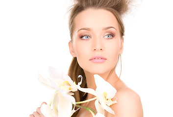 Image showing beautiful woman with white flower