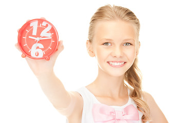 Image showing girl holding alarm clock