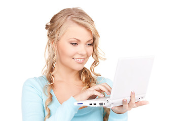 Image showing happy woman with laptop computer