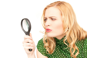 Image showing woman with magnifying glass