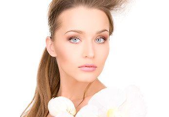 Image showing beautiful woman with white flower