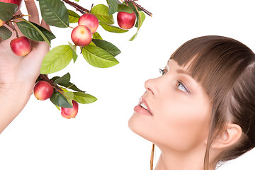 Image showing lovely woman with apple twig