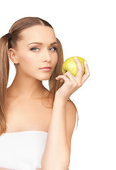 Image showing young beautiful woman with green apple