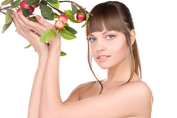 Image showing lovely woman with apple twig