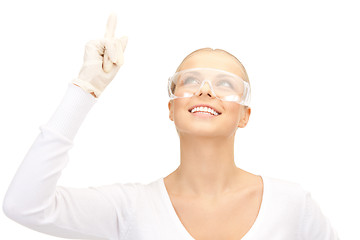 Image showing woman in protective glasses and gloves