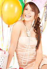 Image showing party girl with balloons and gift box