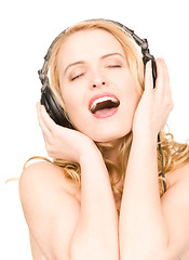 Image showing happy woman in headphones