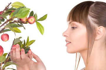 Image showing lovely woman with apple twig