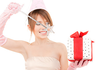 Image showing teenage party girl with magic wand and gift box