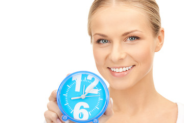 Image showing woman holding alarm clock