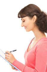 Image showing young attractive businesswoman with notebook