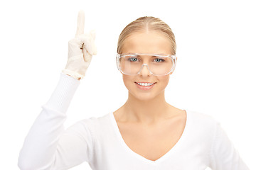 Image showing woman in protective glasses and gloves