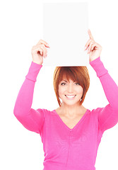 Image showing happy woman with blank board 