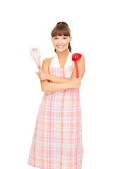 Image showing housewife with red ladle