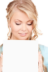 Image showing happy woman with blank board