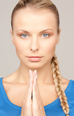 Image showing praying businesswoman