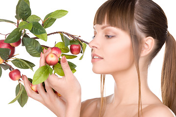 Image showing lovely woman with apple twig