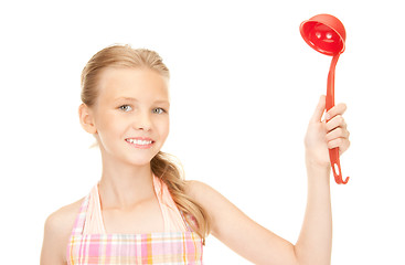 Image showing little housewife with red ladle