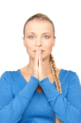 Image showing praying businesswoman