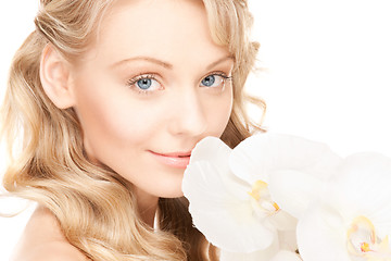 Image showing beautiful woman with white flower