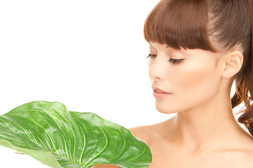 Image showing woman with green leaf