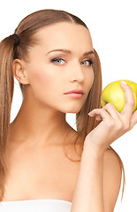 Image showing young beautiful woman with green apple