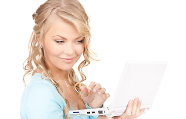 Image showing happy woman with laptop computer