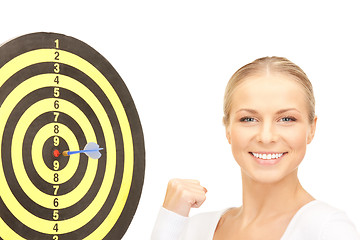 Image showing businesswoman with dart and target