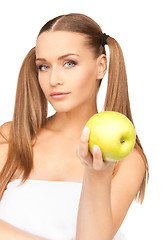 Image showing young beautiful woman with green apple