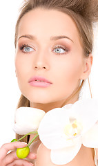 Image showing beautiful woman with white flower