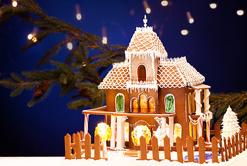 Image showing gingerbread house over christmas background