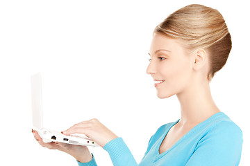 Image showing happy woman with laptop computer