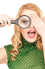 Image showing woman with magnifying glass