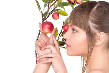 Image showing lovely woman with apple twig