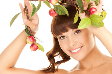 Image showing happy woman with apple twig