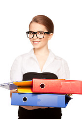 Image showing young attractive businesswoman with folders