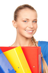 Image showing young attractive businesswoman with folders